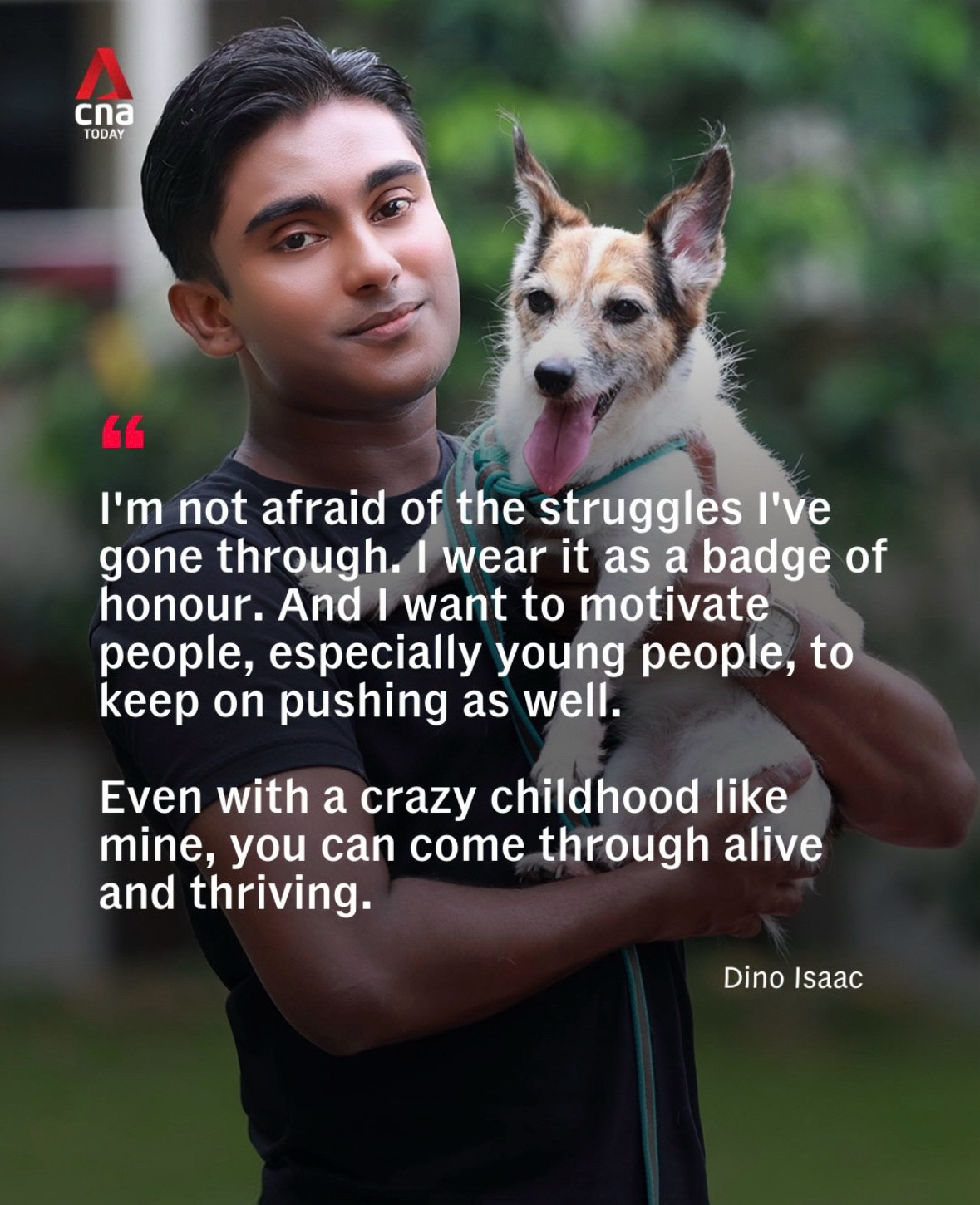 Dino smiling while carrying his dog